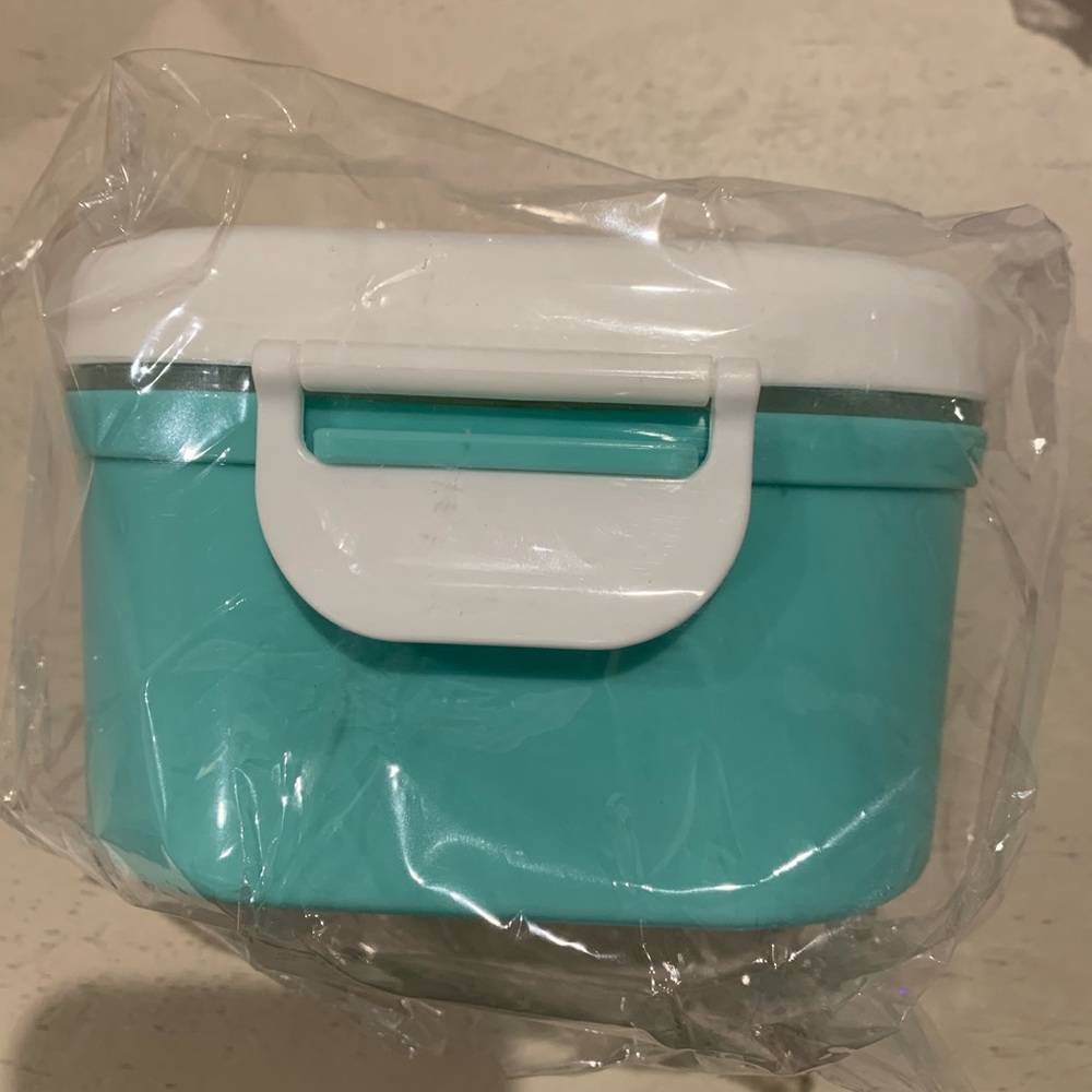 Small travel formula canister.